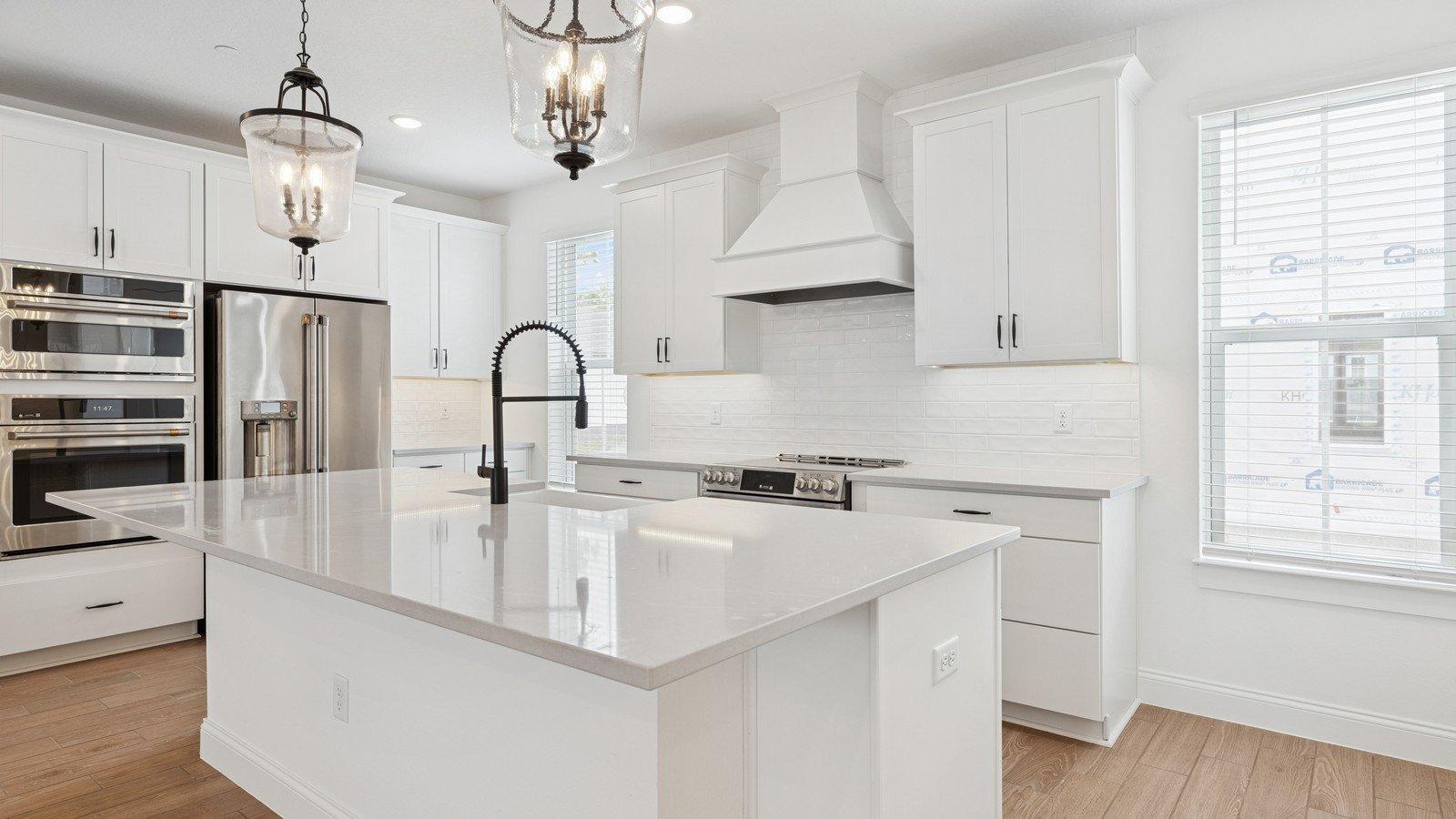Kitchen with wall oven & stainless steel appliances