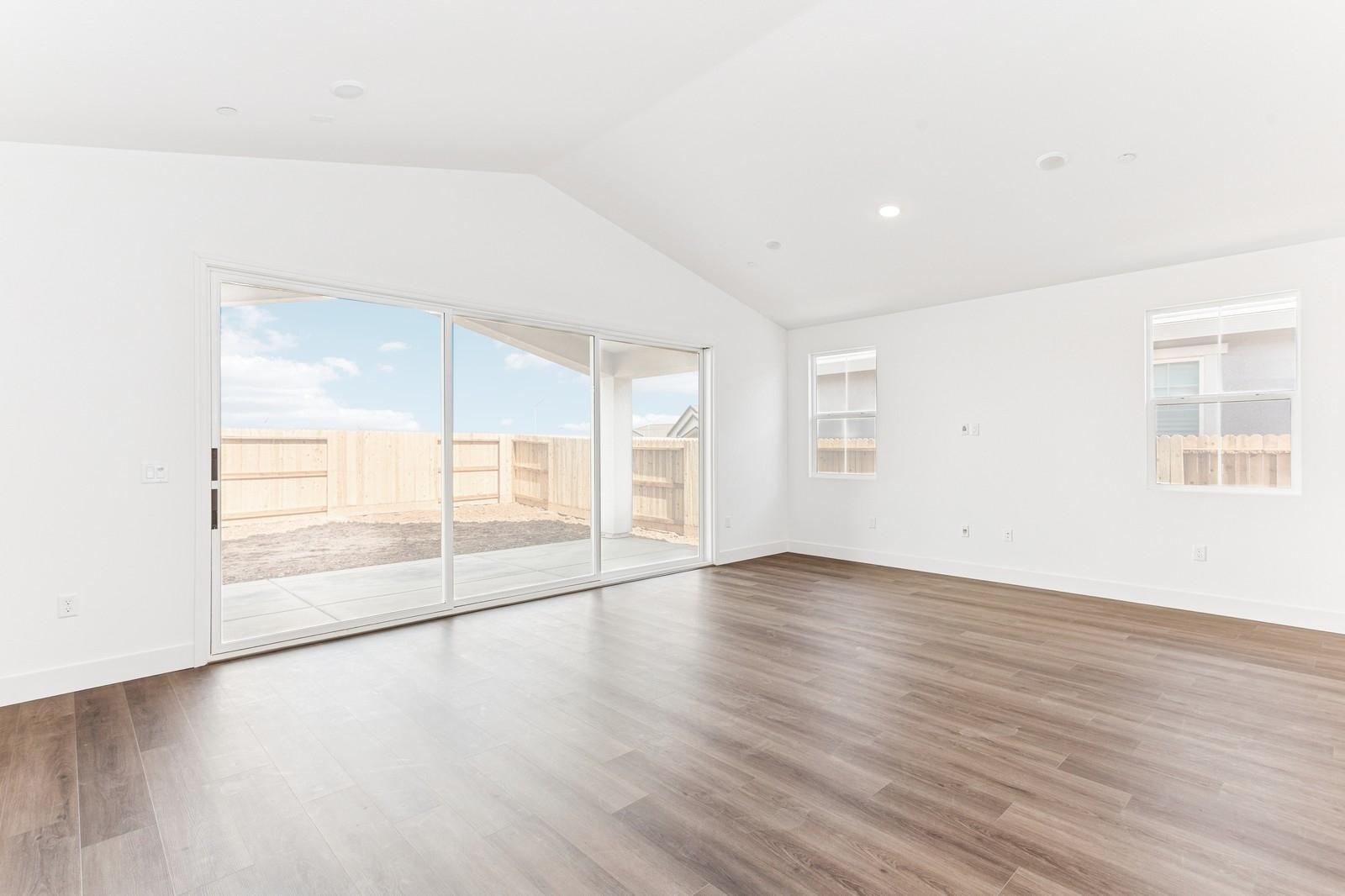 Great room with 15' multi-slide door to covered patio