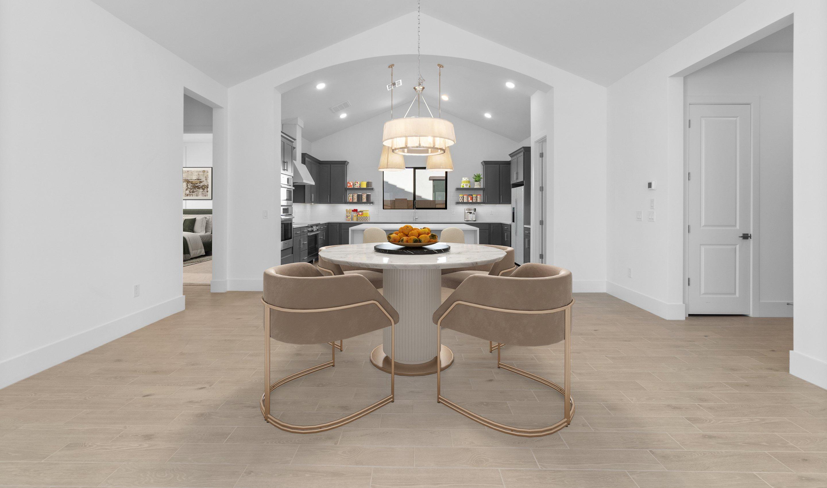 Dining area with archway to kitchen