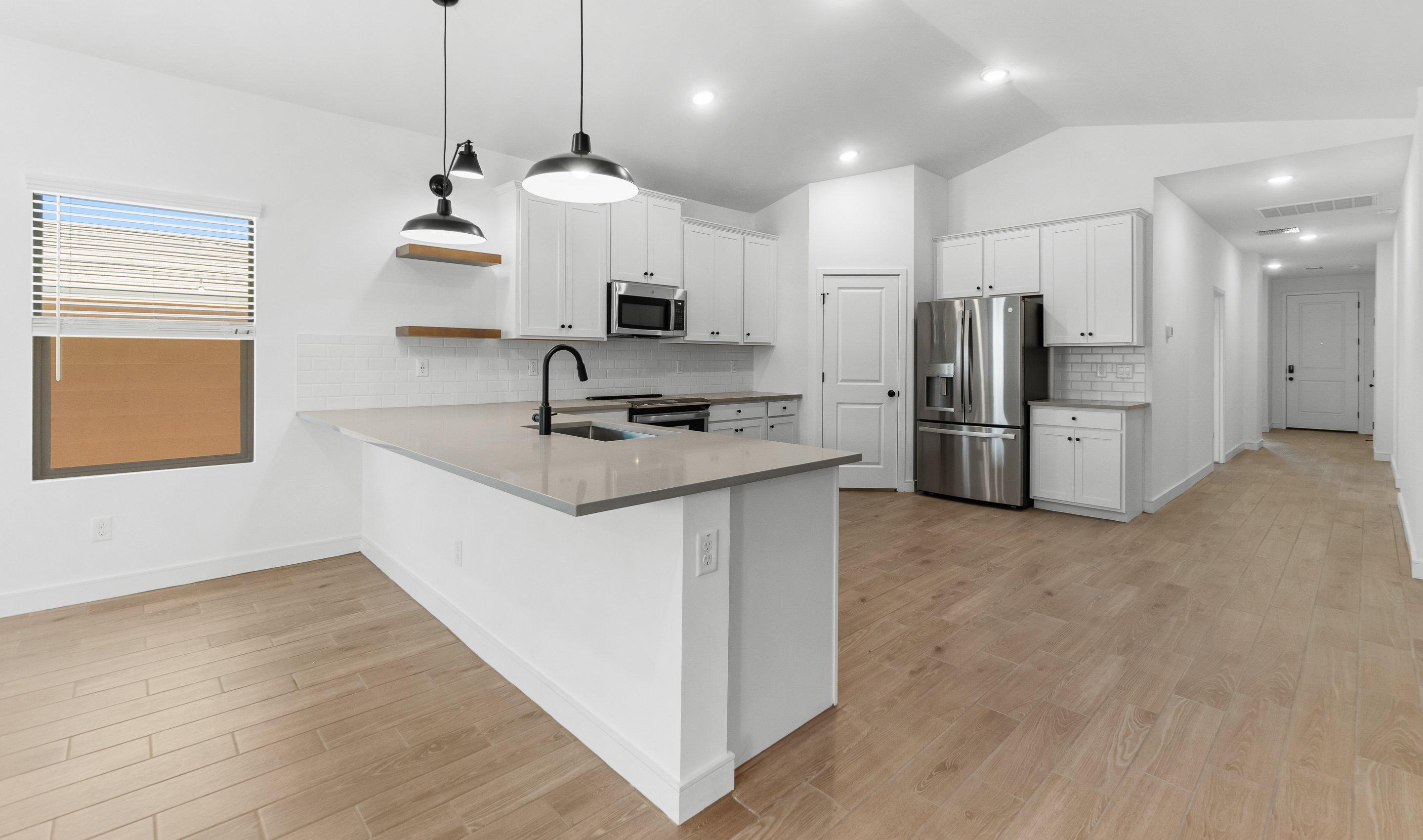 Kitchen with peninsula island