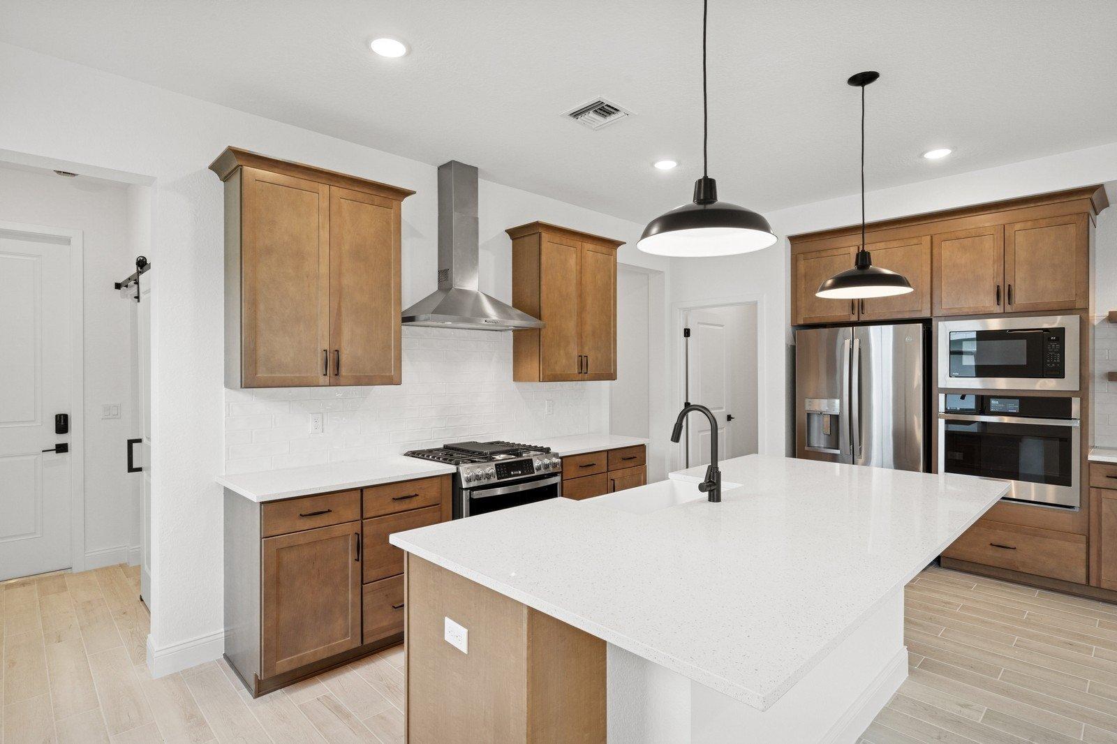 Kitchen with stainless steel appliances