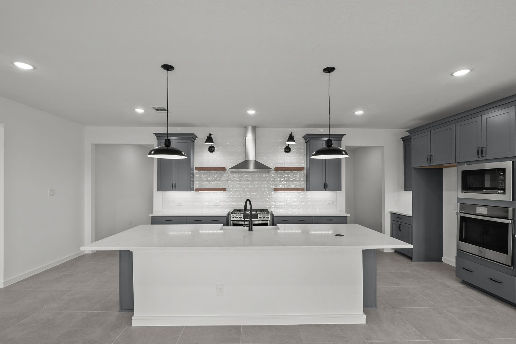 Kitchen with stylish floating shelves
