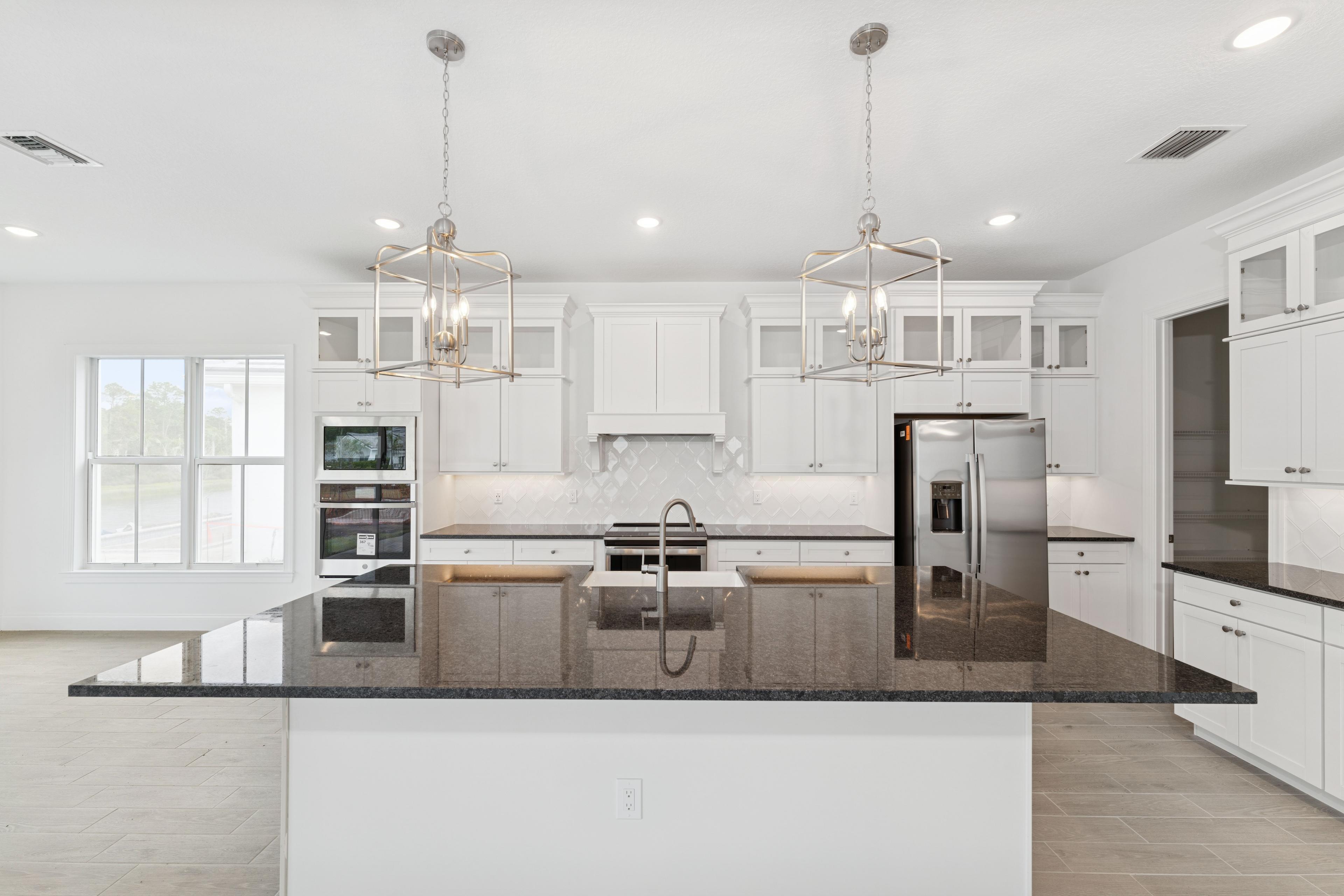 Kitchen with stunning pendant lighting