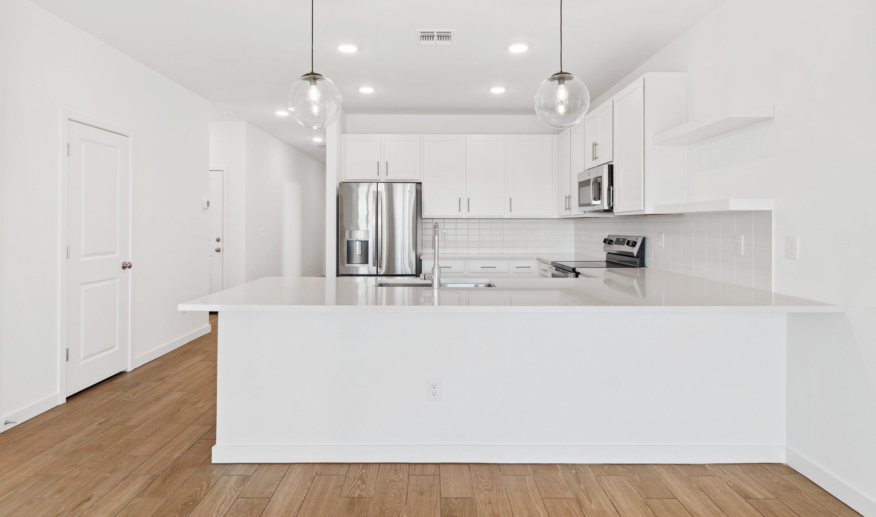 Kitchen with pendant lighting
