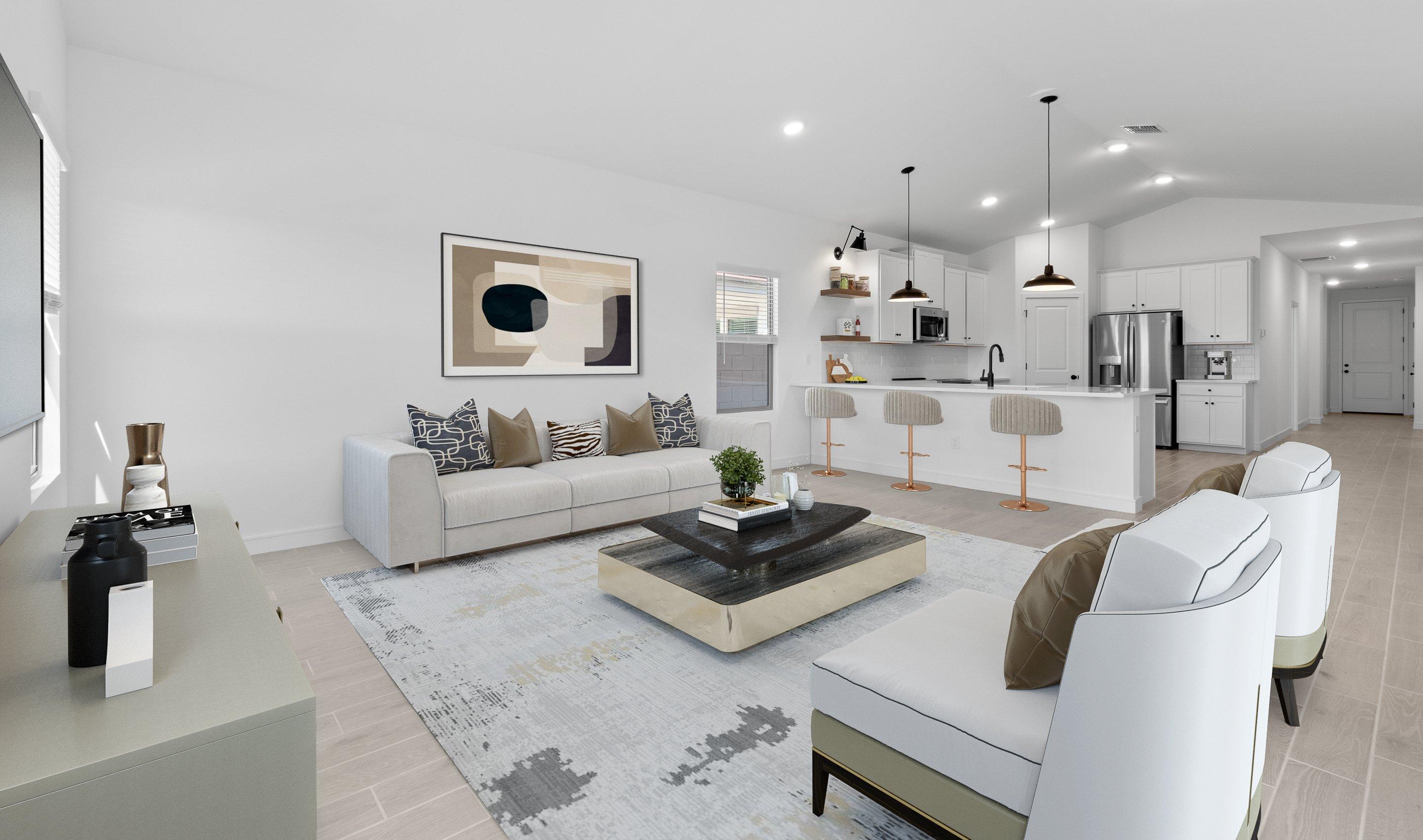 Soaring vaulted ceiling unites main living areas