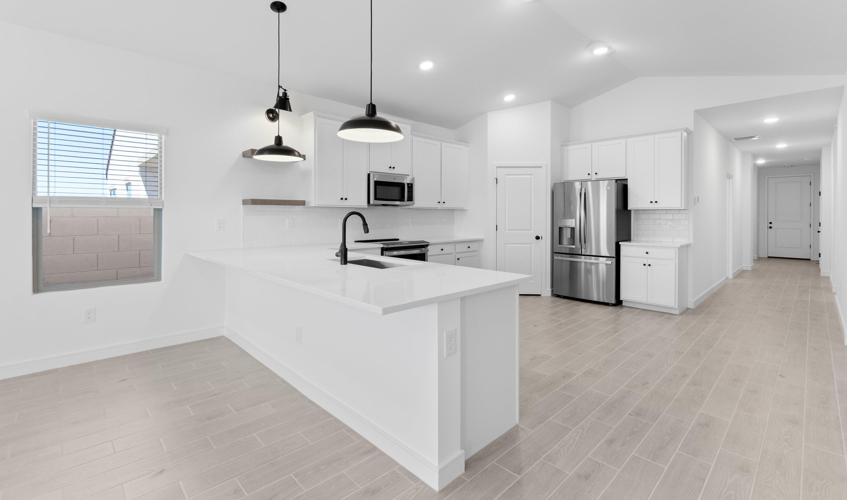 Kitchen with peninsula island
