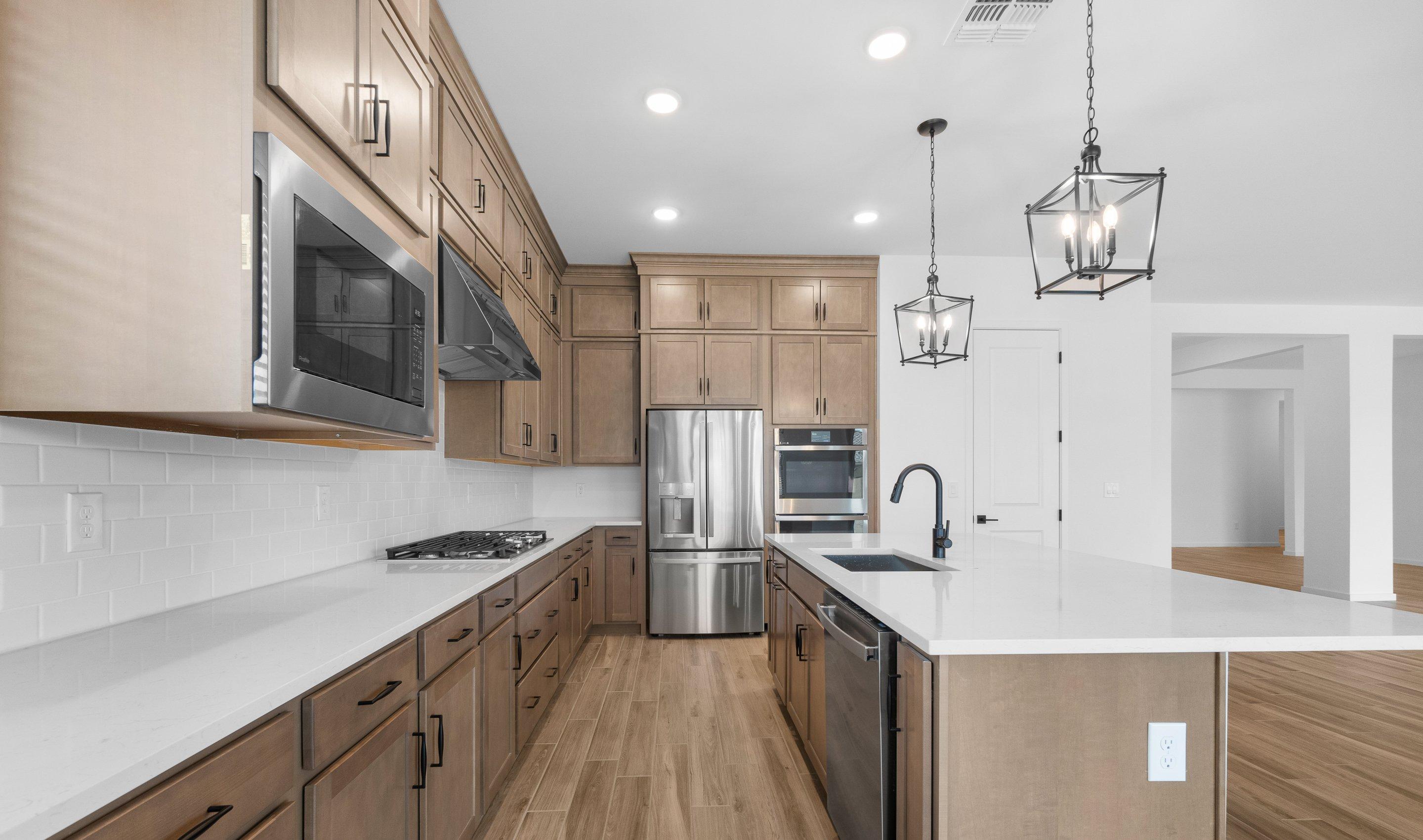 Kitchen with white counters