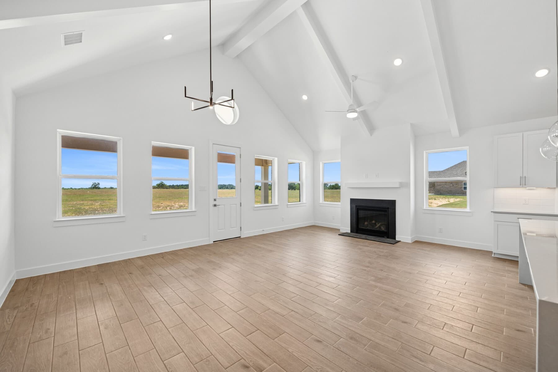 Great room with fireplace and vaulted ceiling