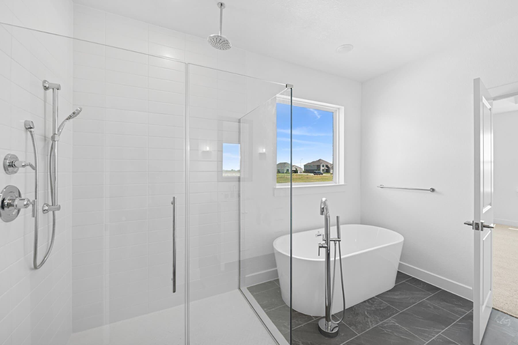 Primary bath with glass shower enclosure