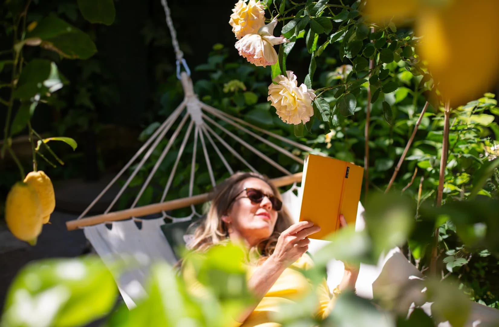 backyard hammock woman reading