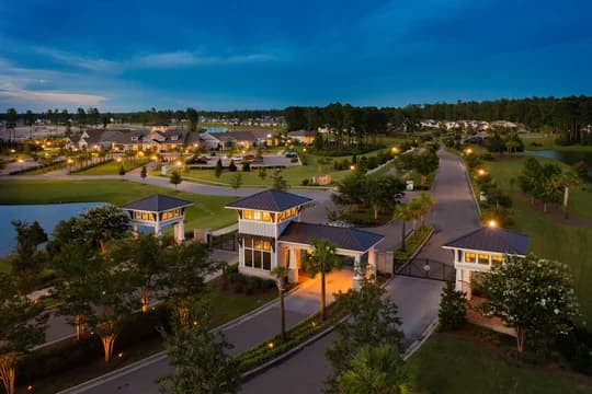 Four Seasons at Lakes of Cane Bay Gatehouse and Clubhouse at Twilight