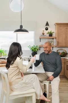 Elevon Frankfurt Couple Having Coffee in Kitchen Farmhouse Palette 6 Level 1