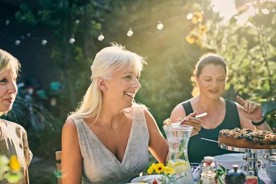 Older Women Dining in the Backyard