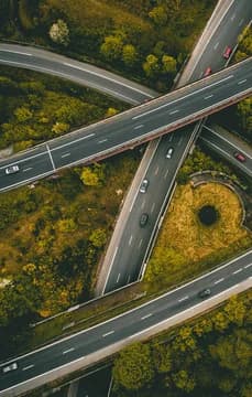 155069 Overhead Shot of Freeway Traffic with Trees USP Crop