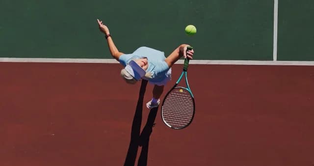Aerial shot of woman playing tennis