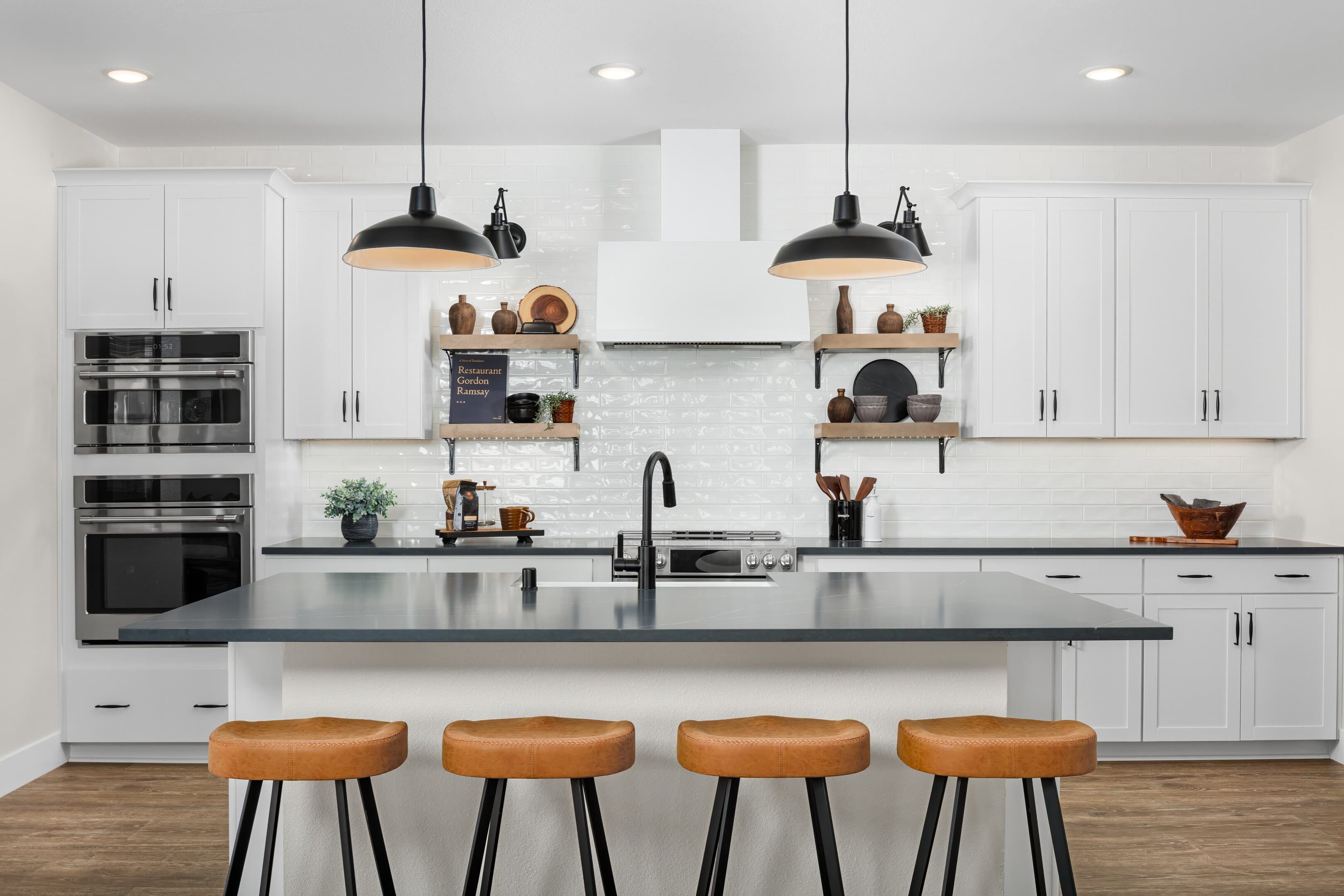 Kitchen with pendant lighting and subway tile backsplash
