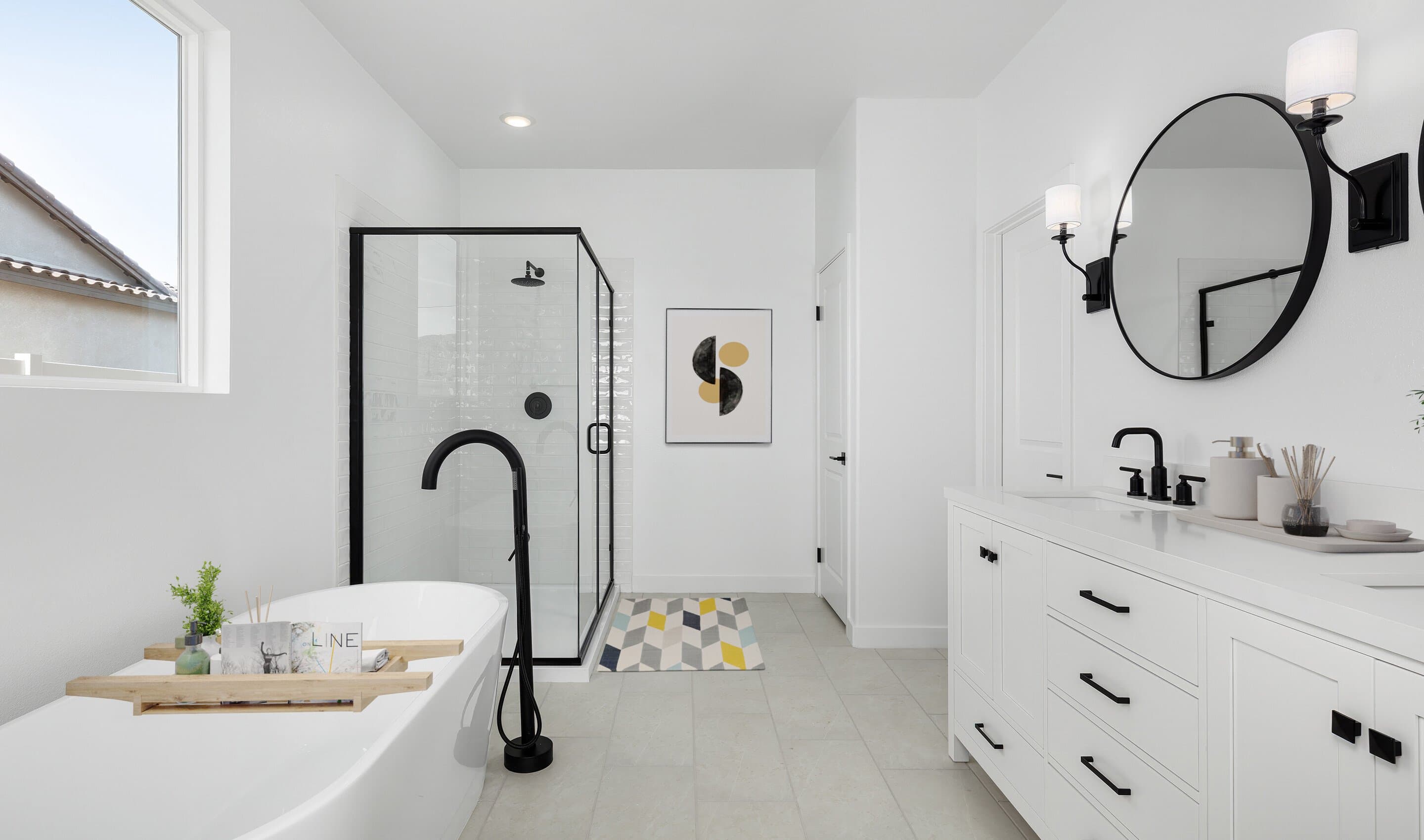 Primary bath with freestanding vanity and circular mirrors