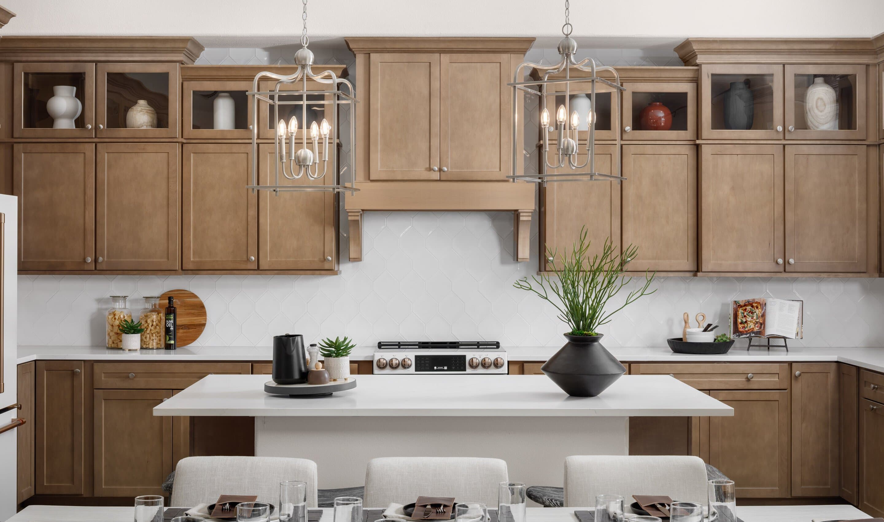 Kitchen with pendant lighting and stunning hood vent