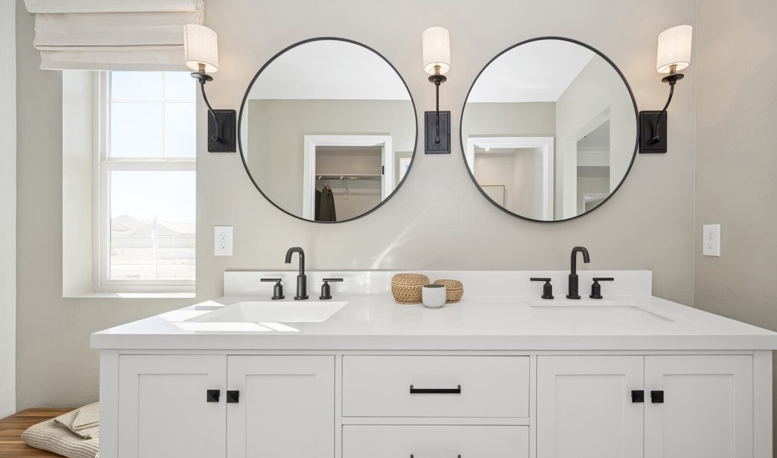 Freestanding vanity with matte black fixtures