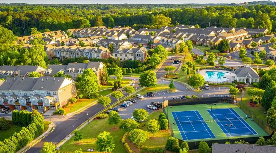 Pool and Tennis Court Amenities in a Gated Community