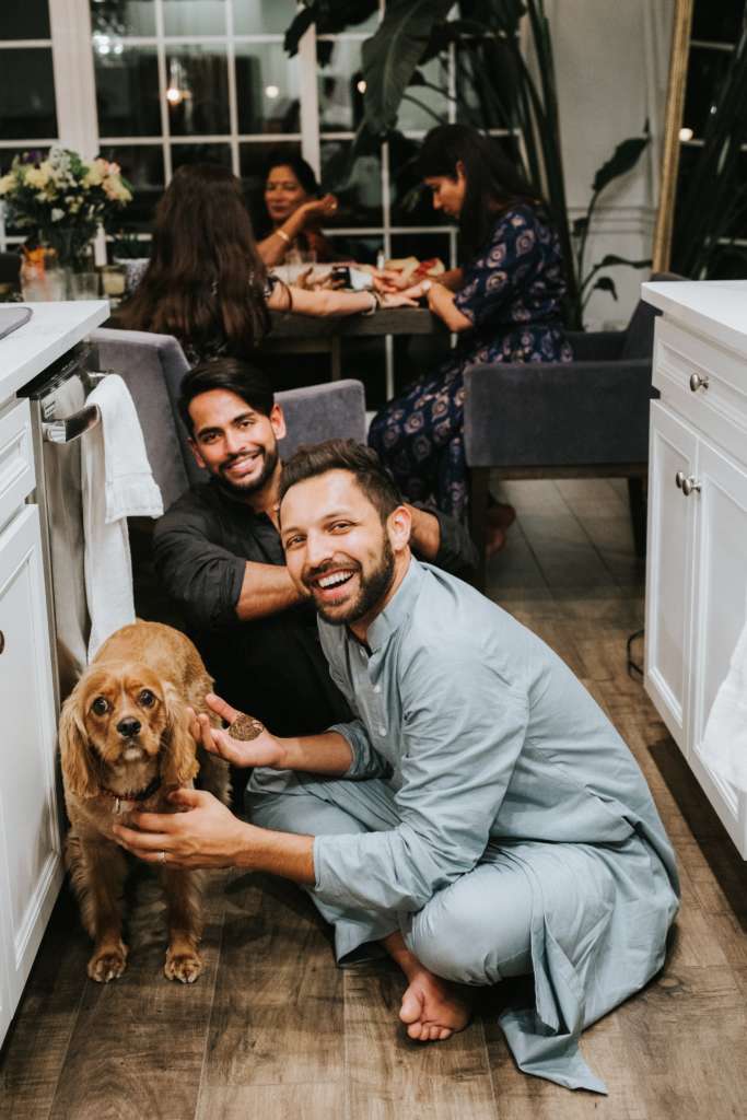 Adam (dog), Aditya, and Amit in their kitchen
